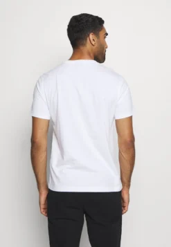 Champion CREWNECK - T-Shirt Print - White -Sommerkleidung Für Herren 30010c6cfb6b4692b9265422752010e5