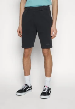 The North Face HERITAGE LOGOWEAR - Jogginghose - Black -Sommerkleidung Für Herren 852c53f6e54e4f9abfdcc01bba43abd5