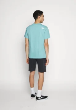 The North Face HERITAGE LOGOWEAR - Jogginghose - Black -Sommerkleidung Für Herren b93494c863284813bb1bfc510518958e