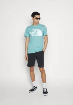 The North Face HERITAGE LOGOWEAR - Jogginghose - Black -Sommerkleidung Für Herren c9fe1b415b764a0fbcaca7503c0a2968