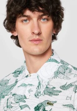 LACOSTE X NETFLIX - Hemd - Bianco -Sommerkleidung Für Herren df741a9513734d5c86d2307493894552